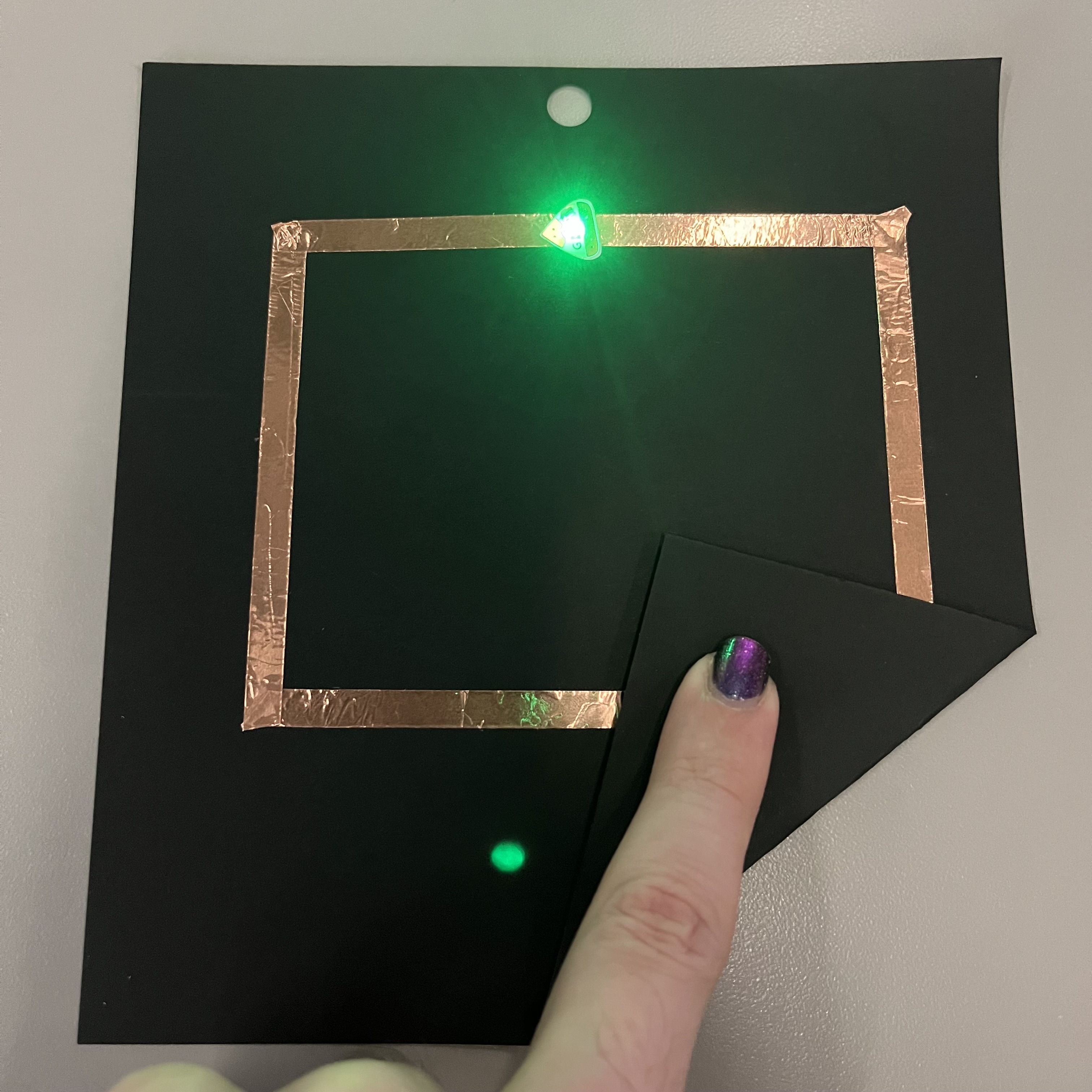 Here is the circuit closed, with the LED light turning on showing that it is functional.