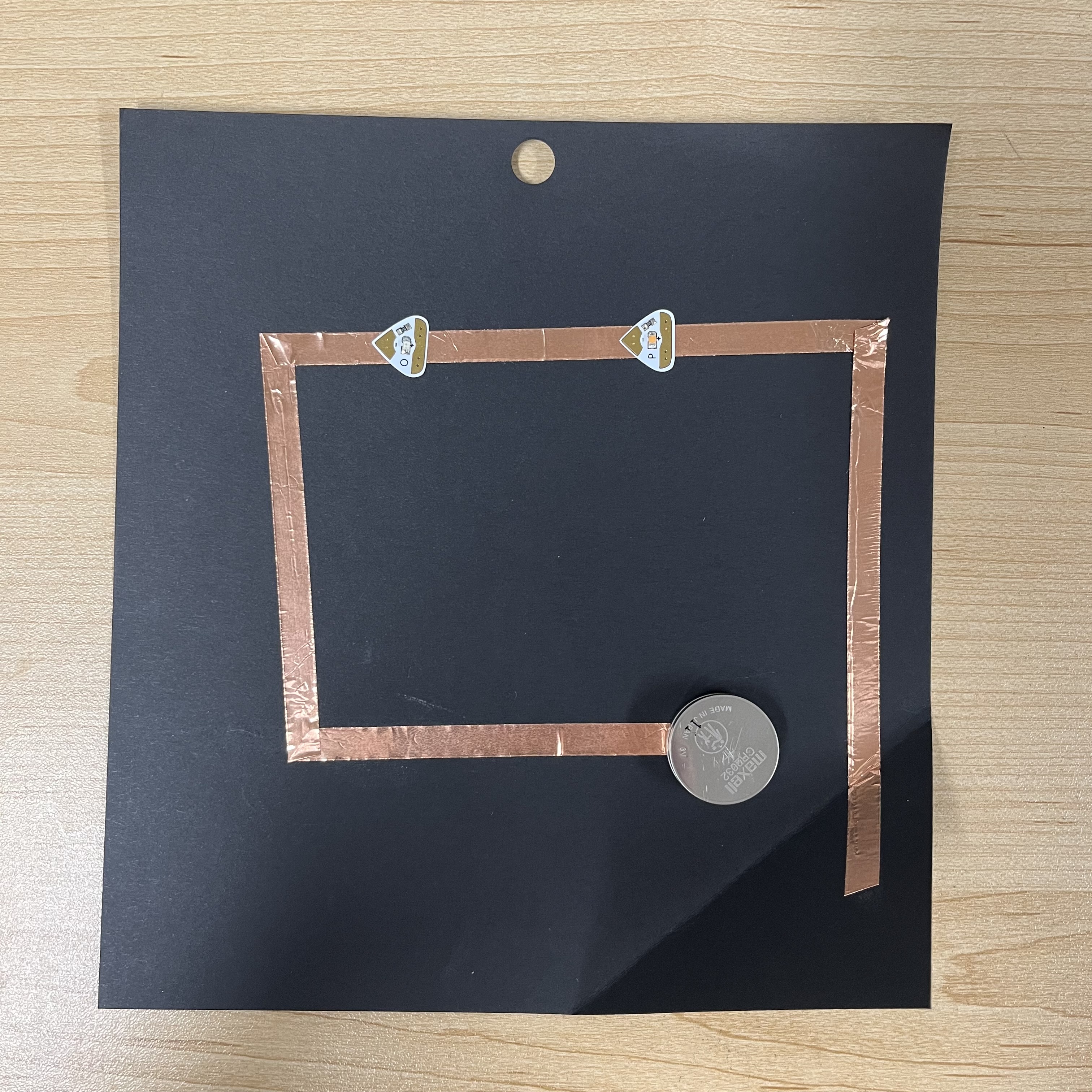 My first series circuit didn't work at first because I forgot I needed 2 batteries, but I built it properly with the necessary gaps after learning from the simple circuit. Here is the assembly of the series circuit.