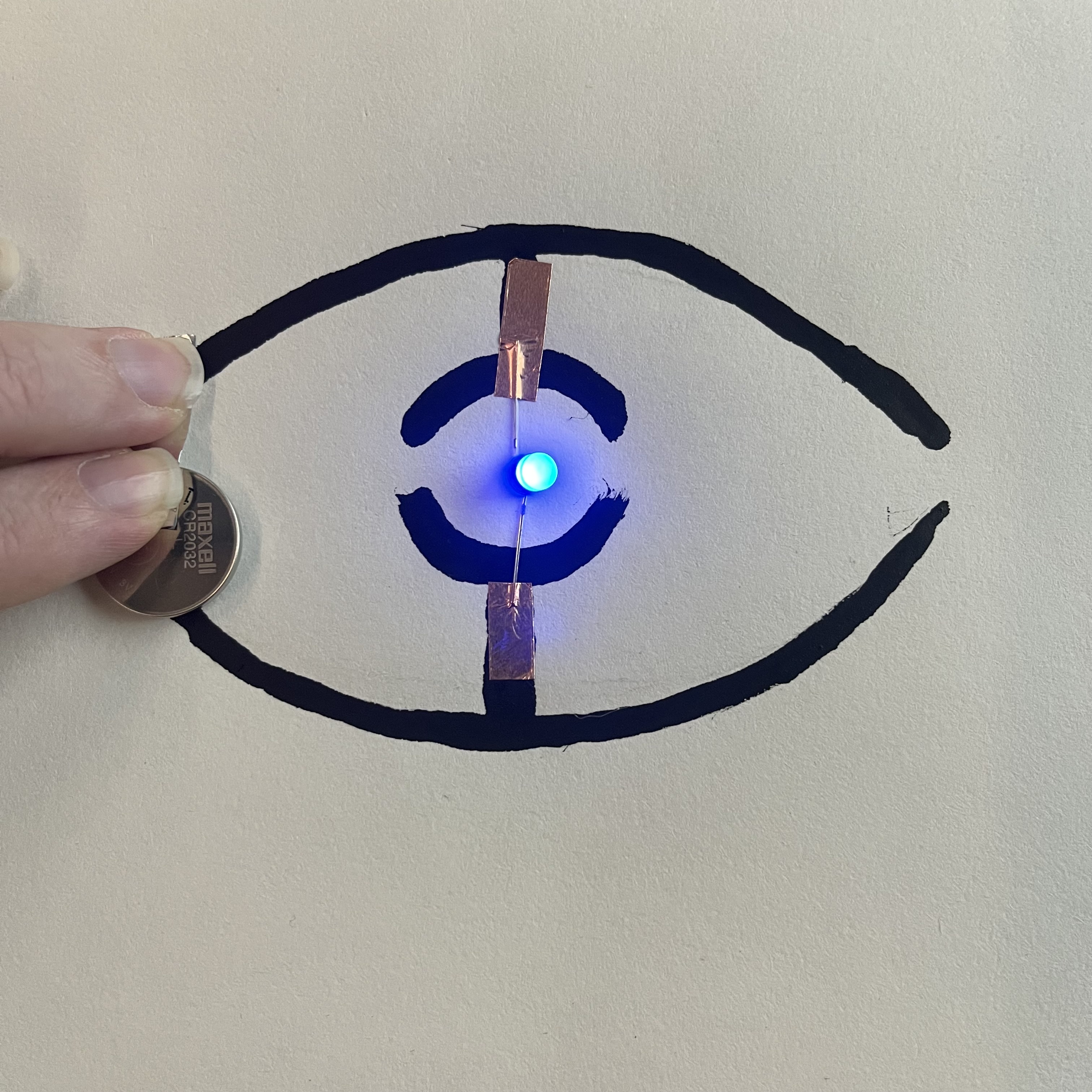 Here is the closed switch version to demonstrate that it works as intended. Circuits are getting easier to make and understand now, it's basically just layering of positive and negative 'tracks' with the right amount of power pushed to the light.