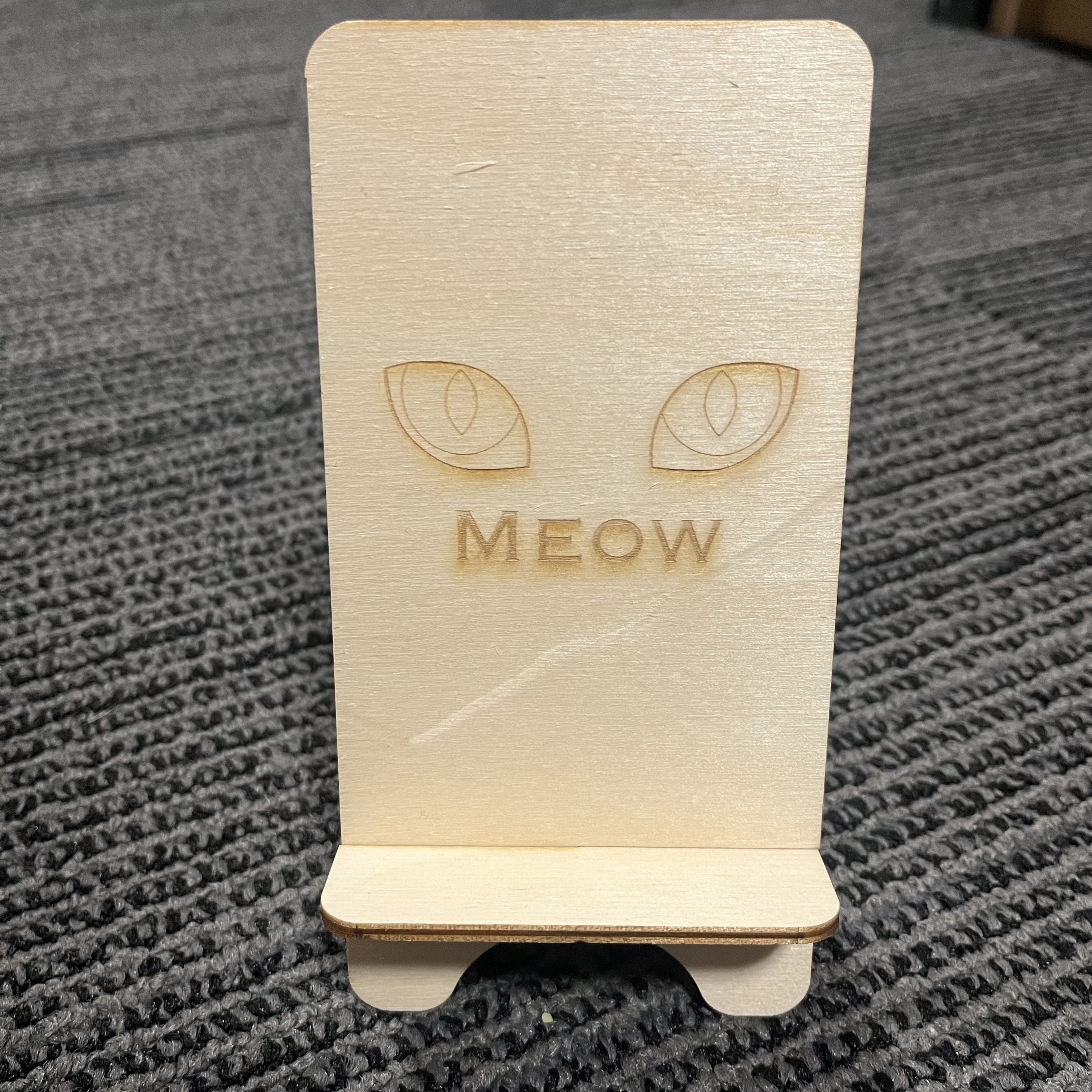 Here is the final stand assembled. I like it, but I don't love it. If I did this again, I would opt for a deeper etch for the outline of the full eye, and fill in the entire iris with a shallow etch so only the white and the pupil weren't etched, giving it a more dramatic look.