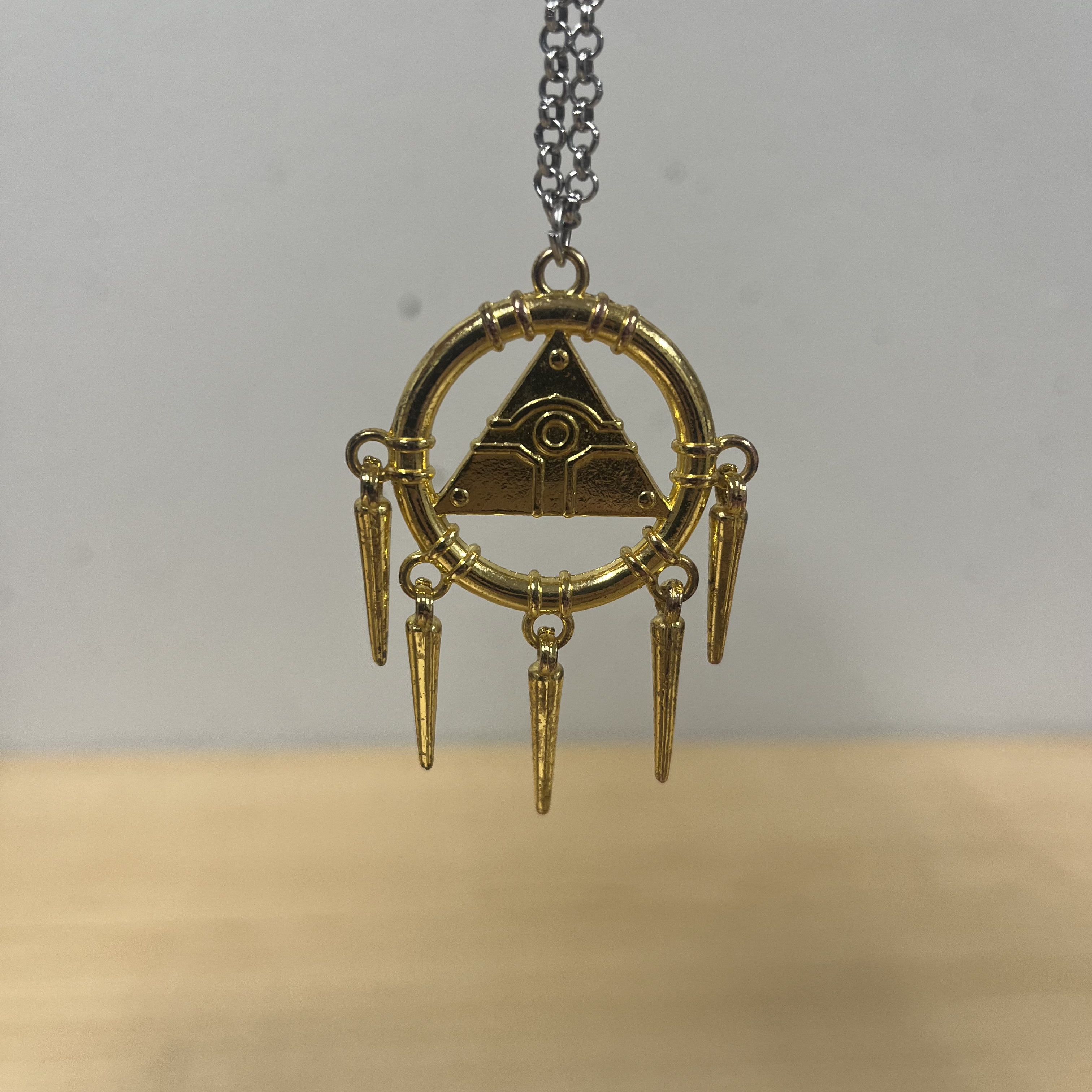 For my final object I decided to use a Yu-gi-oh necklace I bought this year, because I like the line-work shapes and don't have any other objects like that to try and model. This is the Millennium Ring from the original show, and it brings back a lot of happy childhood memories and nostalgia so it will be included in my final objects since they focus on self care.