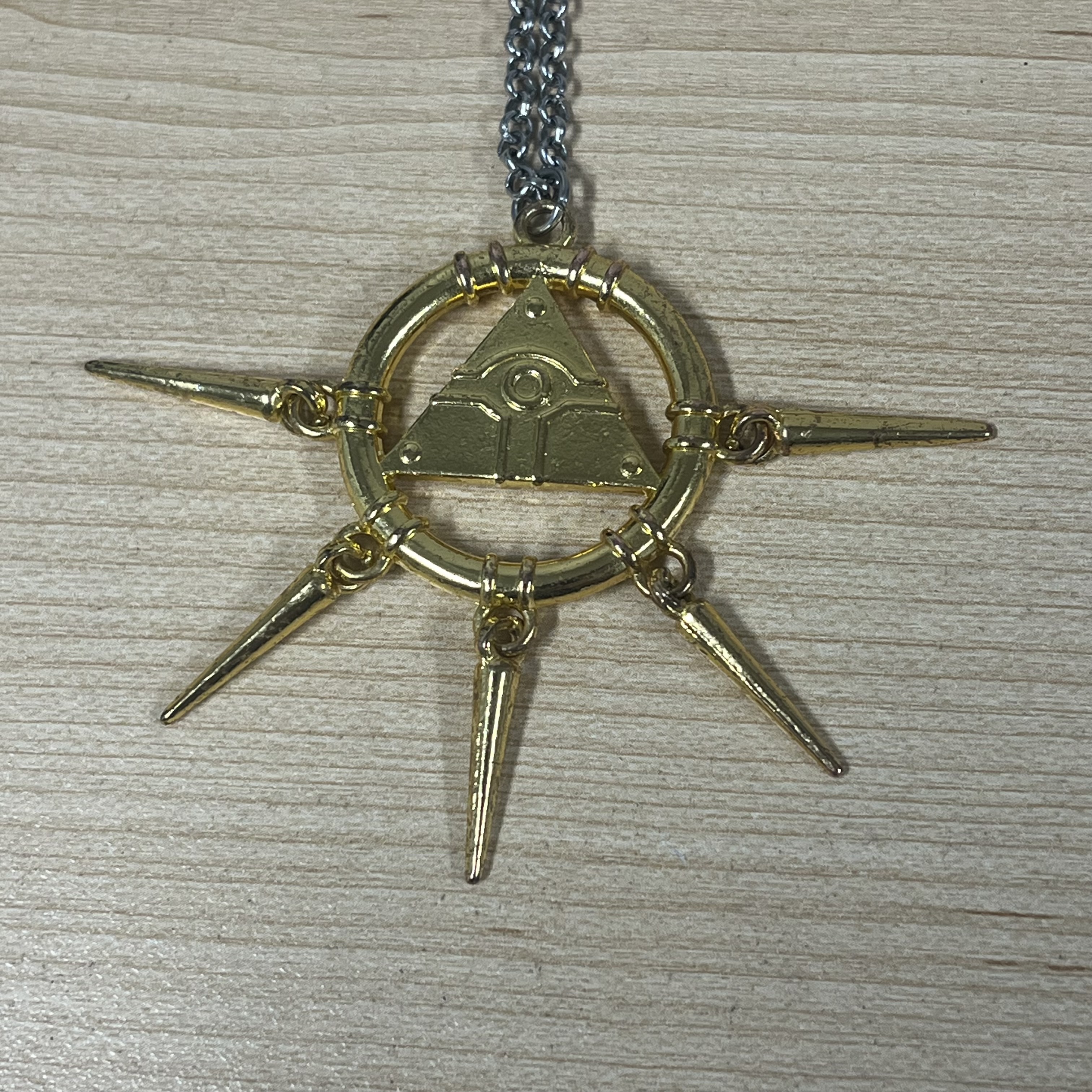 I think I can manage to make most of this using the torus, cones, cylinder, and maybe an array or just a lot of rotation around a central null object. The material will need to be tested often for this to make sure it doesn't create any weird tile effects like in my Stanley mug. If I'm feeling brave I will also model the chain, but I didn't photograph it fully because the metal is rusting and it looks ugly where it rests against my skin.